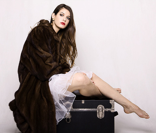 Fashion photograph of woman in fur coat