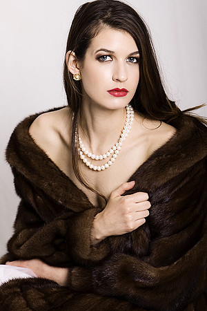 Fashion portrait of woman in fur coat